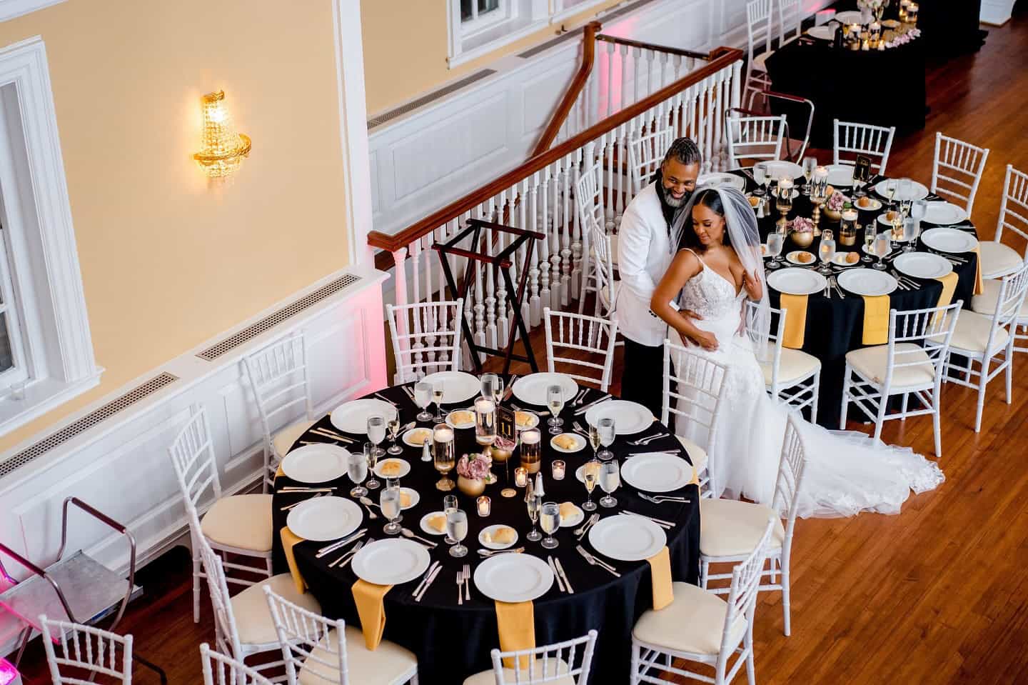 Beautiful bride and groom dancing in wedding reception setting at Zolana Weddings.