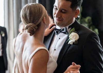 Beautiful bride and groom sharing a special dance during their wedding celebration.