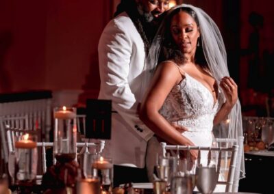 Beautiful bride and groom sharing a romantic moment at wedding reception.