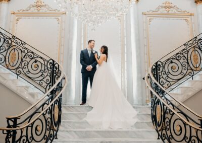 Beautiful bride and groom in elegant wedding attire at a luxurious Zolana Weddings venue.